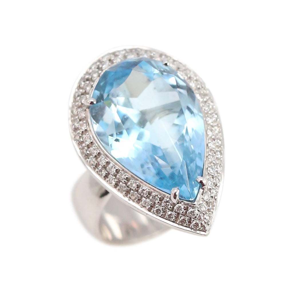 Blue Topaz and Diamond Coktail Ring Covered in Pave Diamonds